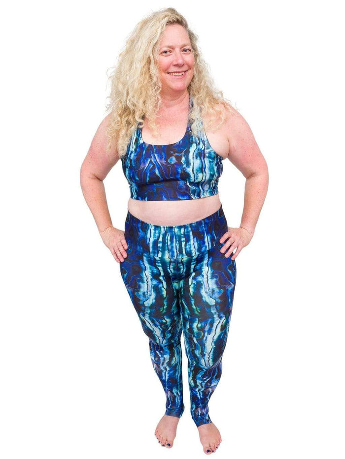 Model: Ruth volunteers for citizen science projects on both salt and freshwater fish and spends as much time as possible in, on, or under the water. She is 5'7", 217 lbs, 40DD and is wearing a 2XL top and legging.