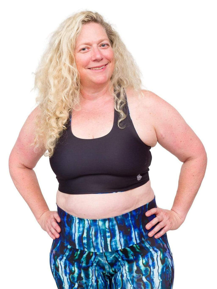 Model: Ruth volunteers for citizen science projects on both salt and freshwater fish and spends as much time as possible in, on, or under the water. She is 5'7", 217 lbs, 40DD and is wearing a 2XL top and legging.