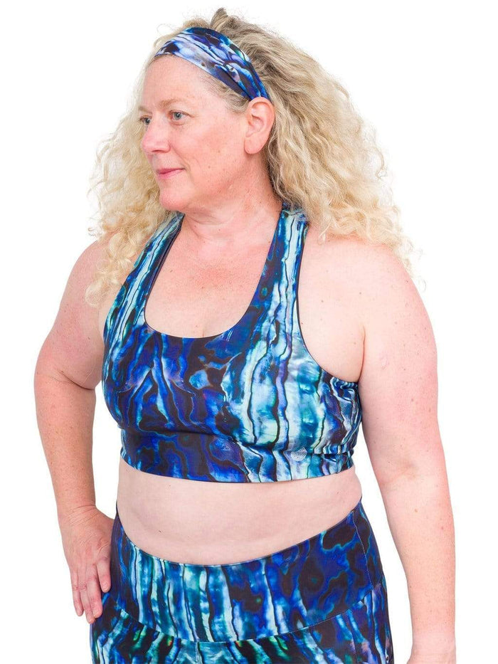 Model: Ruth volunteers for citizen science projects on both salt and freshwater fish and spends as much time as possible in, on, or under the water. She is 5'7", 217 lbs, 40DD and is wearing a 2XL top and legging.
