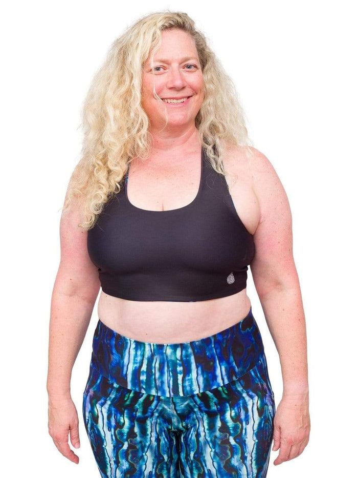 Model: Ruth volunteers for citizen science projects on both salt and freshwater fish and spends as much time as possible in, on, or under the water. She is 5'7", 217 lbs, 40DD and is wearing a 2XL top and legging.