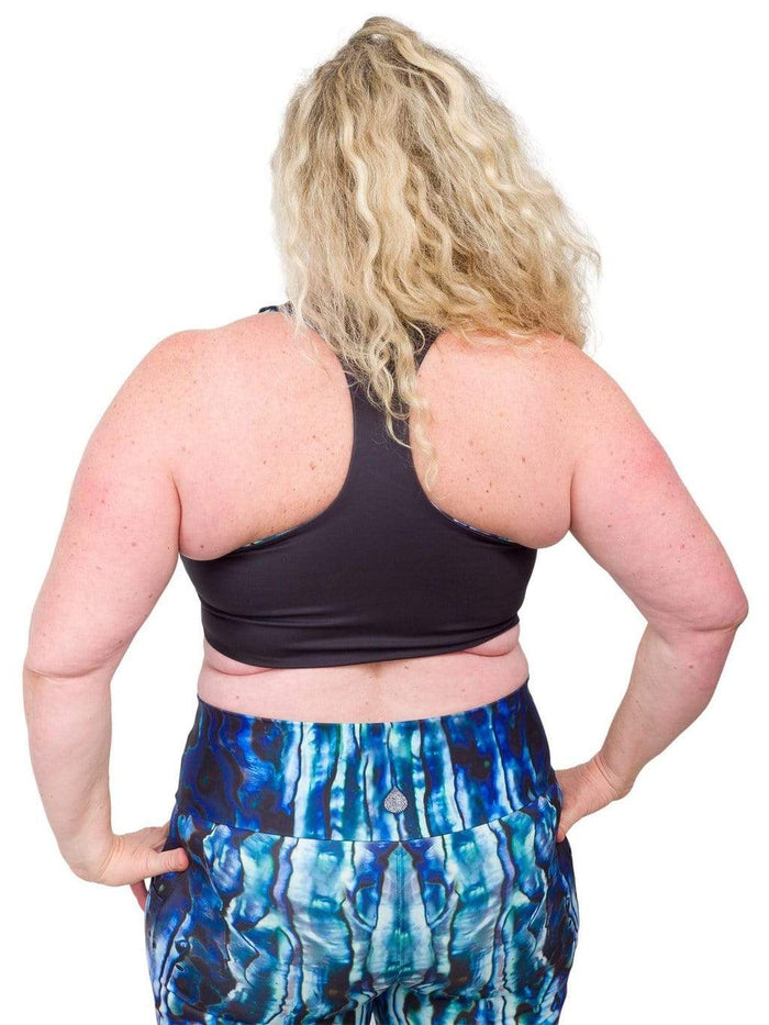 Model: Ruth volunteers for citizen science projects on both salt and freshwater fish and spends as much time as possible in, on, or under the water. She is 5'7", 217 lbs, 40DD and is wearing a 2XL top and legging.