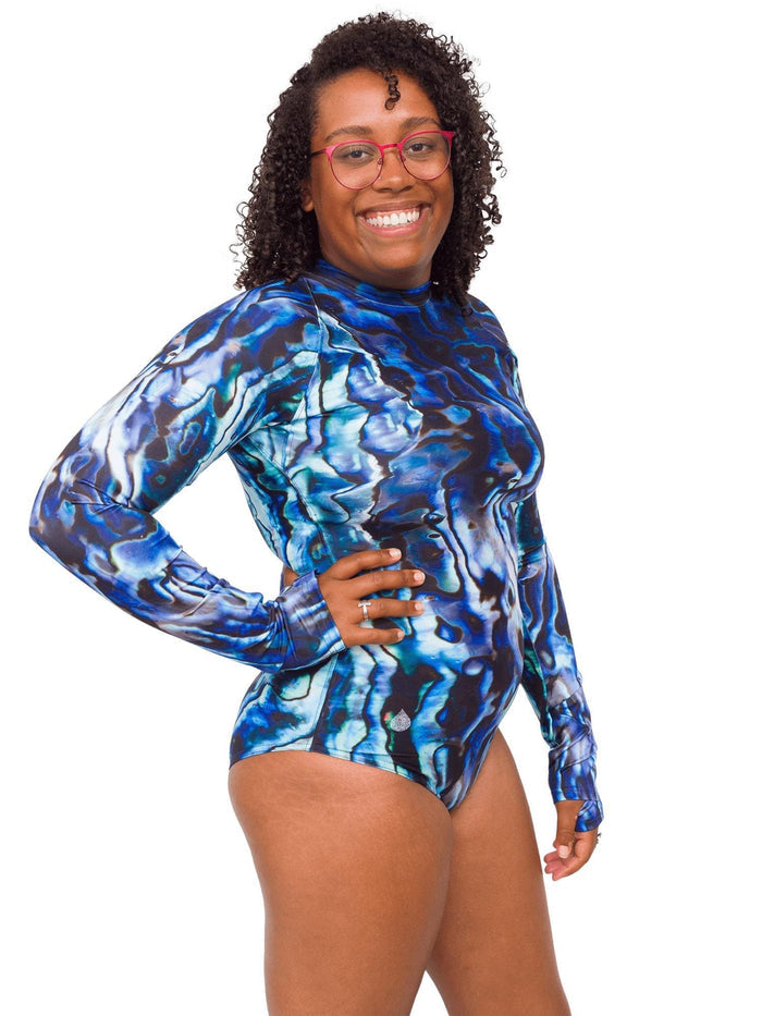 Model: Amani is the CFO of Minorities in Shark Sciences and a shark scientist. She is 5'3", 160 lbs, 36C and is wearing a M