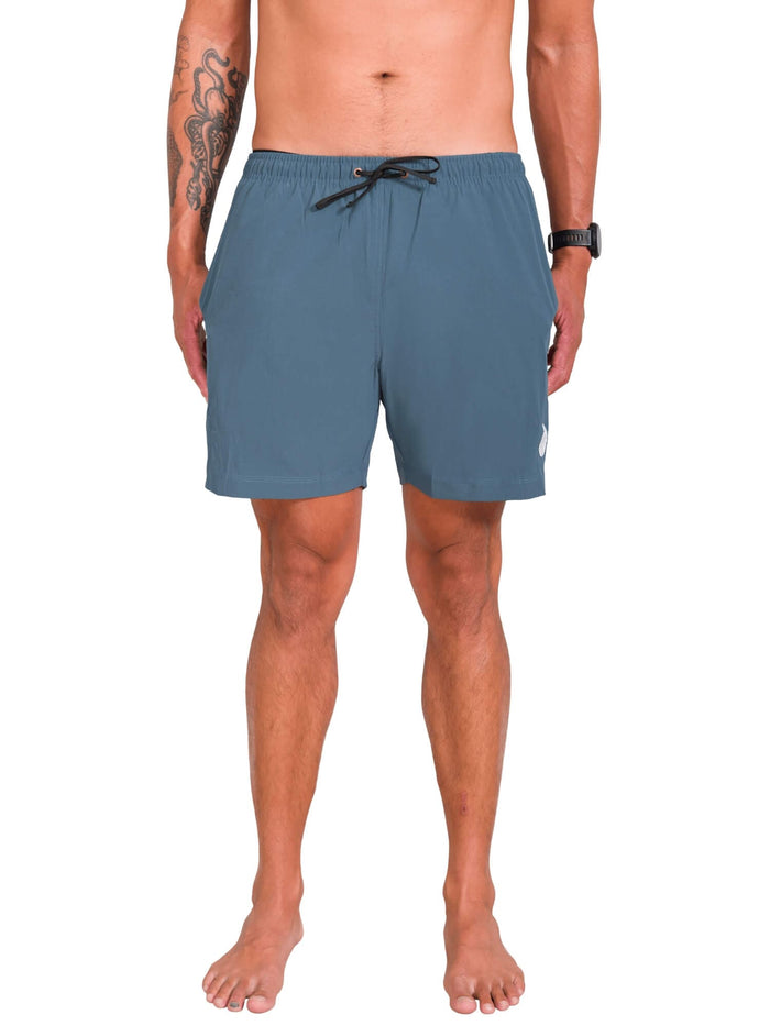 Model: Kevin is a marine and molecular biologist researching the impacts of ocean warming on corals. He is 6'1", 175 lbs, and is wearing a size S short.