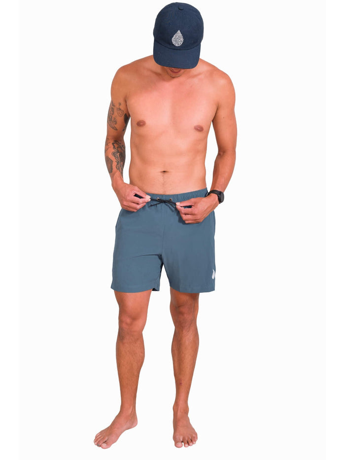Model: Kevin is a marine and molecular biologist researching the impacts of ocean warming on corals. He is 6'1", 175 lbs, and is wearing a size S short.