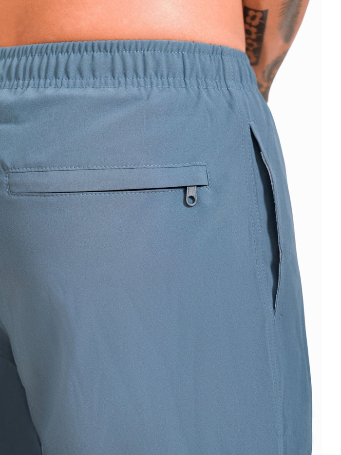 Model: Self-draining back pocket with corrosion-resistant zipper.