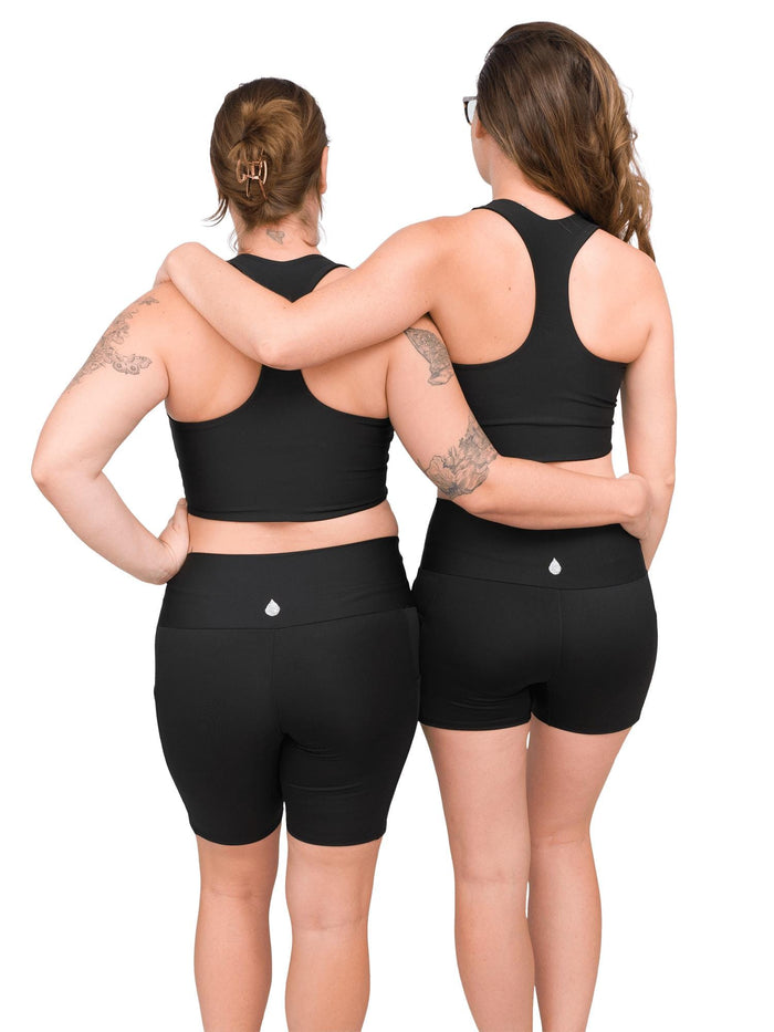 Model: Camilla (left) is 5'8", 180 lbs, 36B and wearing a size L shorts and L top. Laura (right) is 5'11", 150lbs, 34B, and wearing a size M top and M shorts.