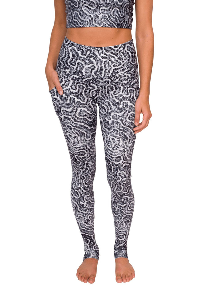 Model: Liv is a coral conservation scientist. She is 5'8", 130lbs and is wearing a size M Reversible Top and size S Legging.