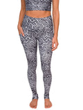 Model: Liv is a coral conservation scientist. She is 5'8", 130lbs and is wearing a size M Reversible Top and size S Legging.