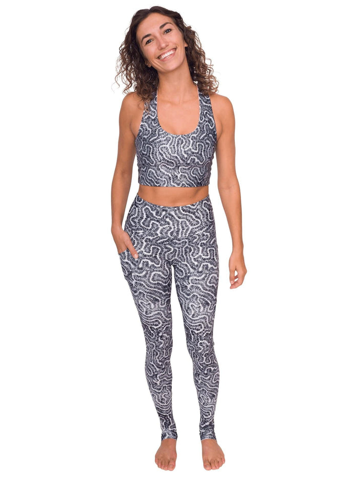 Model: Liv is a coral conservation scientist. She is 5'8", 130lbs and is wearing a size M Reversible Top and size S Legging.