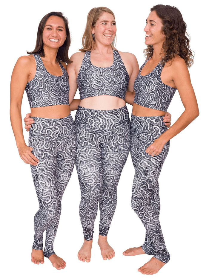 Model: Remedy (left) is 5'7", 130lbs, and is wearing a size S Reversible Top and XS Legging. Erin (center) is 5'9", 170lbs, and is wearing a size L Reversible Top and Legging. Liv (right) is 5'8", 130lbs and is wearing a size M Reversible Top and size S Legging.