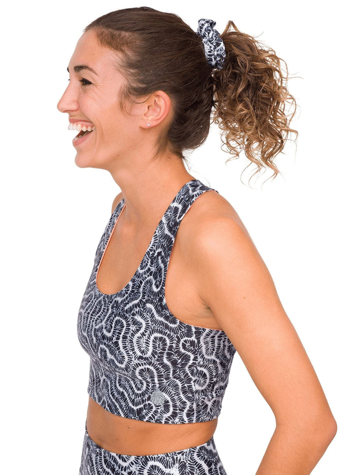 Model: Liv is a coral conservation scientist. She is 5'8", 130lbs and is wearing a size M Reversible Top and size S Legging.