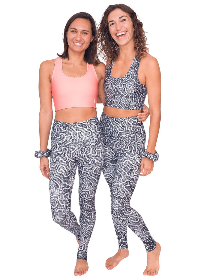 Model: Remedy (left) is 5'7", 130lbs, and is wearing a size S Reversible Top and XS Legging. Liv (right) is 5'8", 130lbs and is wearing a size M Reversible Top and size S Legging.
