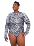 Model: Candace is a PhD candidate in the Predator Ecology & Conservation Lab at FIU and the first Bahamian scientist dedicated specifically to shark research. She is 5'9", 230 lbs, and is wearing a 2XL Sun Suit.