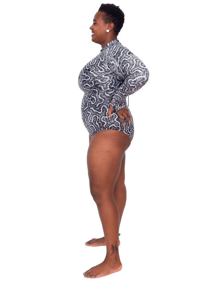 Model: Candace is a PhD candidate in the Predator Ecology & Conservation Lab at FIU and the first Bahamian scientist dedicated specifically to shark research. She is 5'9", 230 lbs, and is wearing a 2XL Sun Suit.
