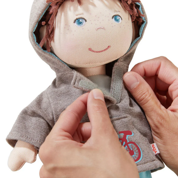 Velcro close on doll's hoodie