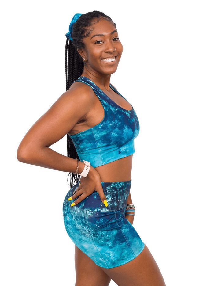 Model: Carlee is a shark & sea turtle scientist and co-founder of Minorities in Shark Sciences. She is 5'7", 145 lbs, 36C and is wearing a M short and S top.