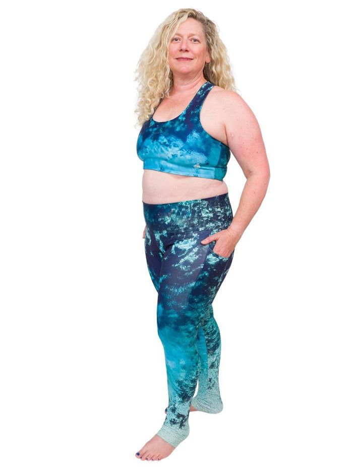 Model: Ruth volunteers for citizen science projects on both salt and freshwater fish and spends as much time as possible in, on, or under the water. She is 5'7", 217 lbs, 40DD and is wearing a 2XL top and legging.