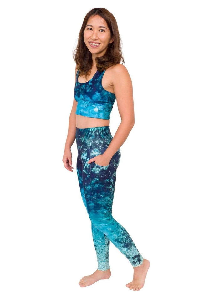 Model: Laura is a hurricane researcher and avid scuba diver. She is 5'3", 120lbs, 34B and is wearing a S top and leggings.