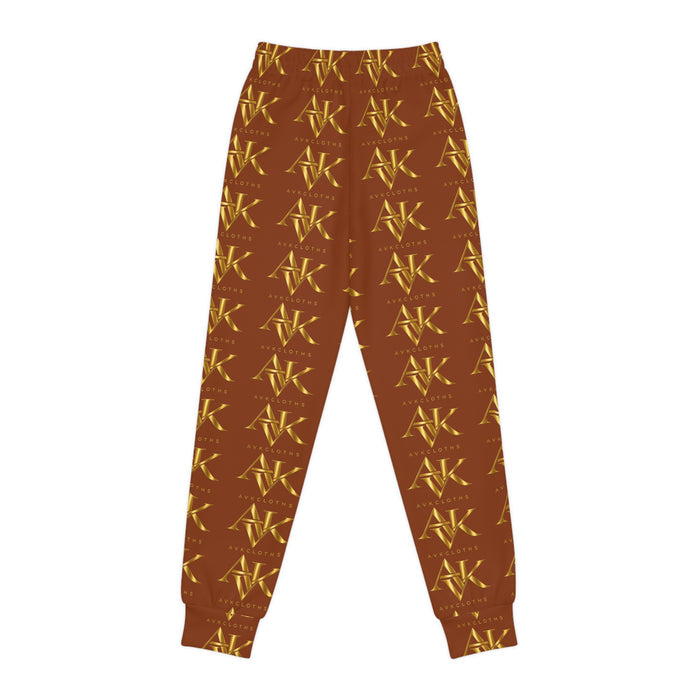 Golden Monogram Youth Joggers — All-Over Brown & Gold Logo Sweatpants