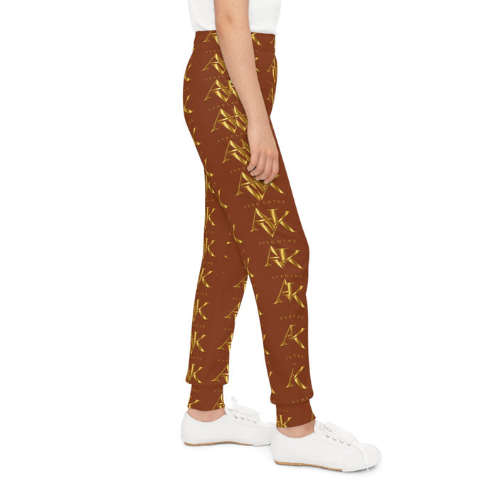 Golden Monogram Youth Joggers — All-Over Brown & Gold Logo Sweatpants