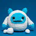 Crocheted blue and white yeti