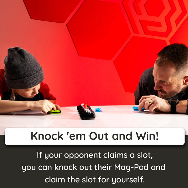 Two people playing a game with magnetic components.