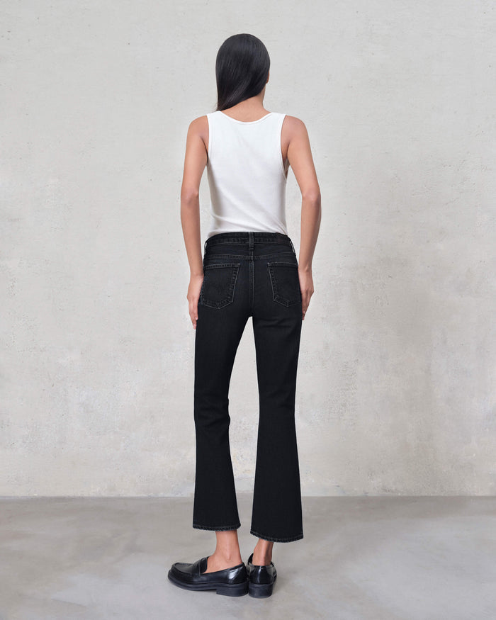 Back view of EDWIN USA designer women's jeans made in USA with flared hem and fitted silhouette