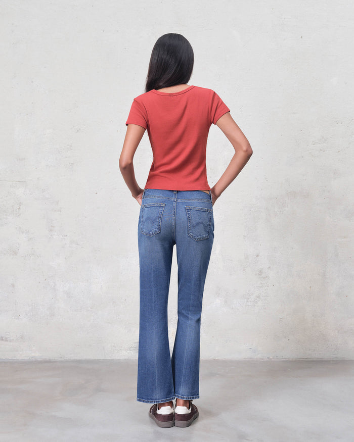 EDWIN USA premium ankle bootcut denim on model seen from back wearing red tee and casual shoes