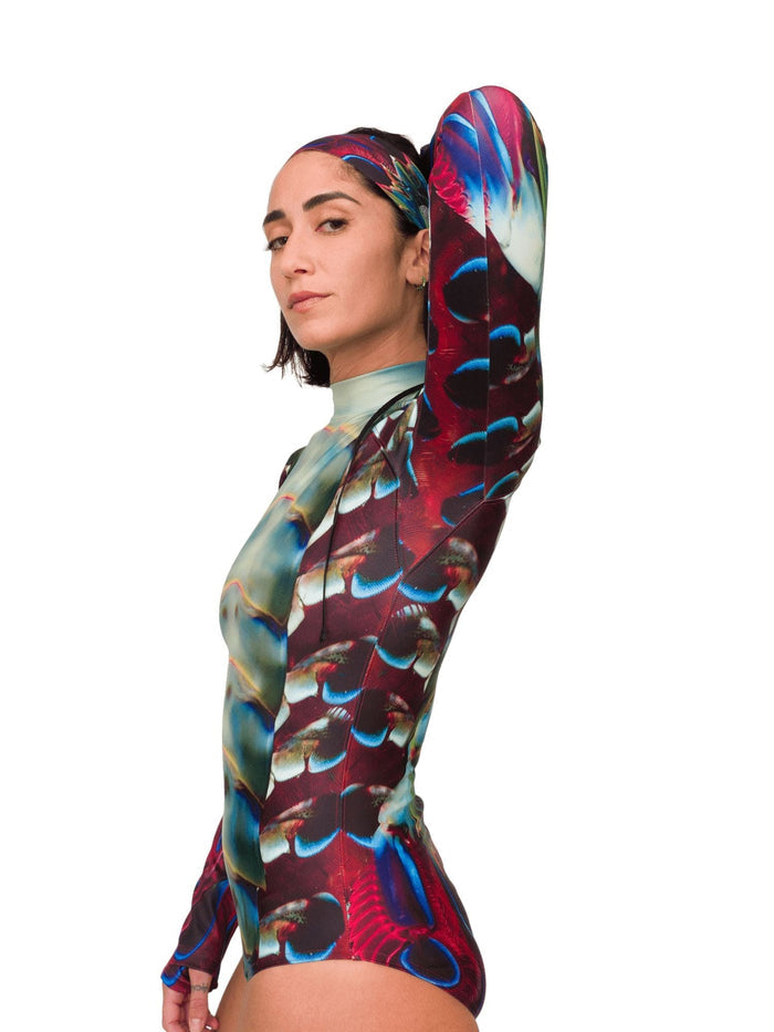 Model: Shireen is an underwater photographer, filmmaker, and scientist. She is 5'7", 145lbs, and wearing a size M Sun Suit.