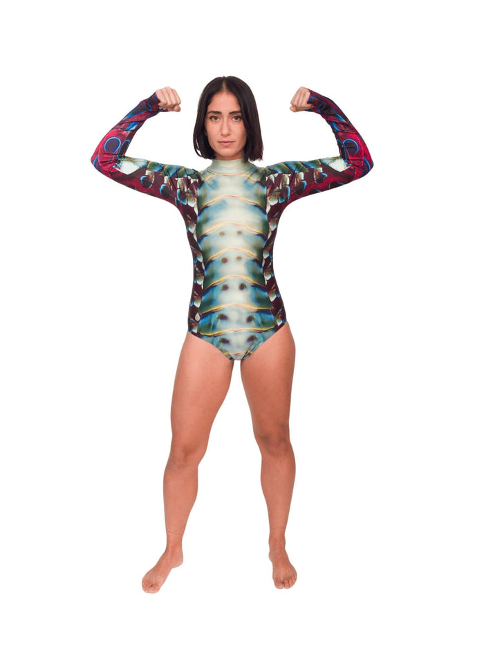 Model: Shireen is an underwater photographer, filmmaker, and scientist. She is 5'7", 145lbs, and wearing a size M Sun Suit.