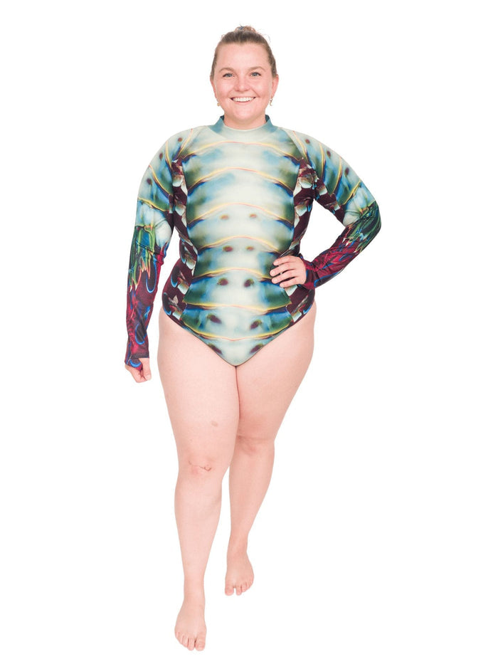 Model: Erin works to educate students and the community about conservation issues in South Florida. She is 5'5", 225lbs, and wearing a size 2XL sun suit.