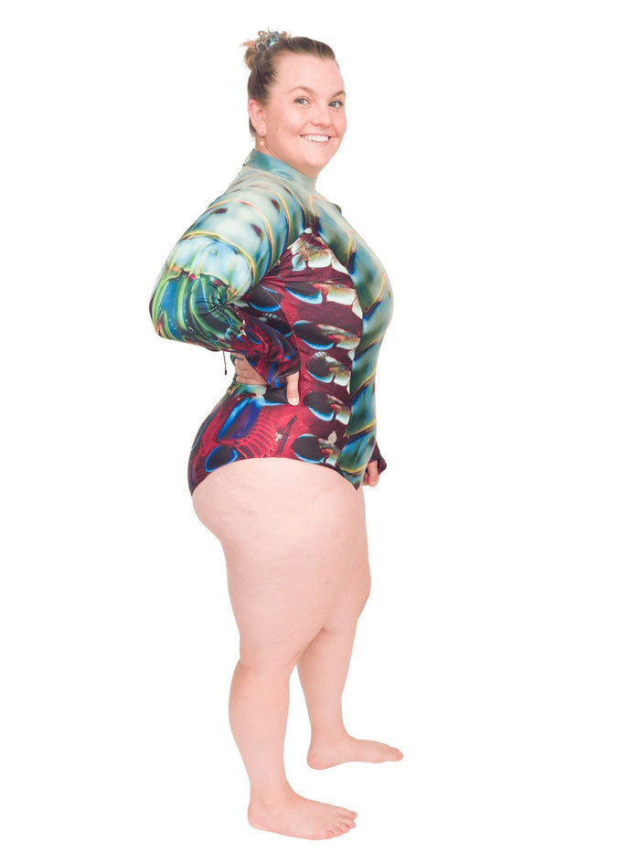 Model: Erin works to educate students and the community about conservation issues in South Florida. She is 5'5", 225lbs, and wearing a size 2XL sun suit.