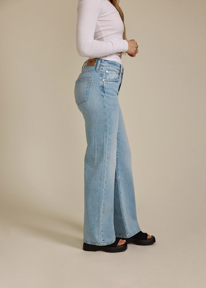 EDWIN USA high rise wide leg jeans for women in light blue denim styled with black sandals