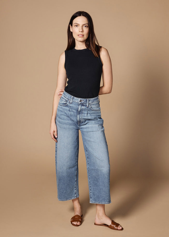 EDWIN USA women's cropped straight leg jeans in light blue denim styled with a black sleeveless top