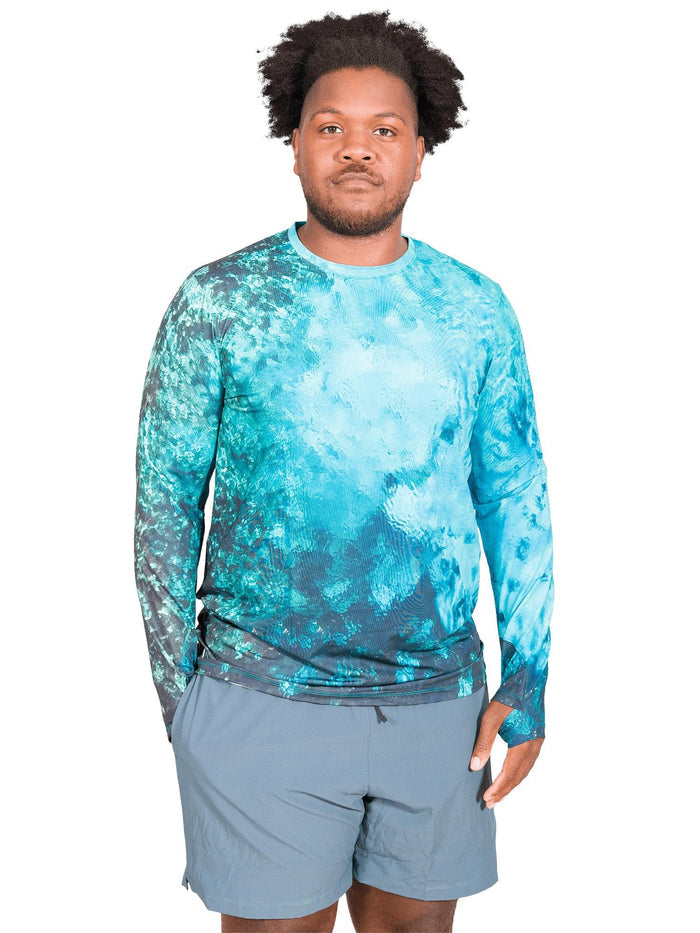 Model: Theo dedicates his free time to volunteering with local non-profits to remove debris from our waterways, and restoring habitats. He is 6'2", 260lbs, and wearing a size XL Men's Crew Neck Sun Shirt and 2XL Best Day Ever Short.