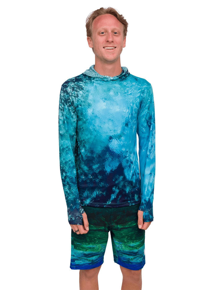 Model: Jake is a shark scientist and educator with Field School. He is 5'10", 135lbs and wearing a size S shirt and 29 boardshorts.