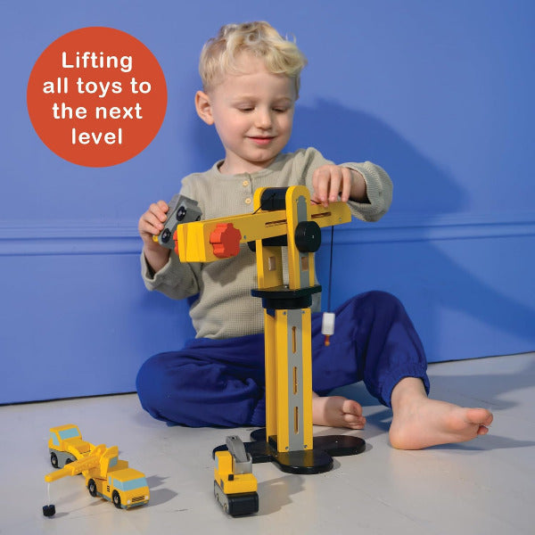 Child playing with a toy construction set