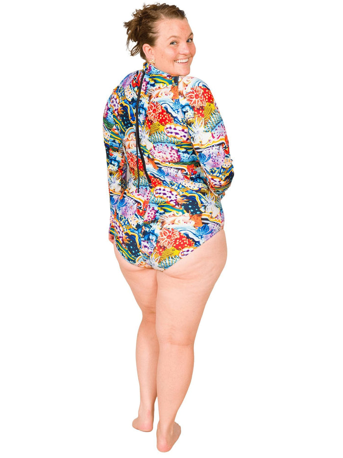 Model: Erin works to educate students and the community about conservation issues in South Florida. She is 5'5", 225lbs, and wearing a size 2XL.