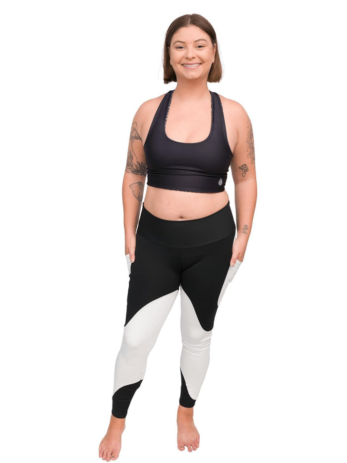 Model: Camilla is the Operations Manager here at Waterlust. She loves using her camera to communicate marine conservation issues. She is 5'8", 180lbs, and is wearing a L legging and L spotted eagle ray top (reverse side).