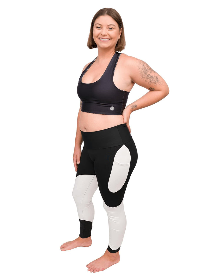 Model: Camilla is the Operations Manager here at Waterlust. She loves using her camera to communicate marine conservation issues. She is 5'8", 180lbs, and is wearing a L legging and L spotted eagle ray top (reverse side).