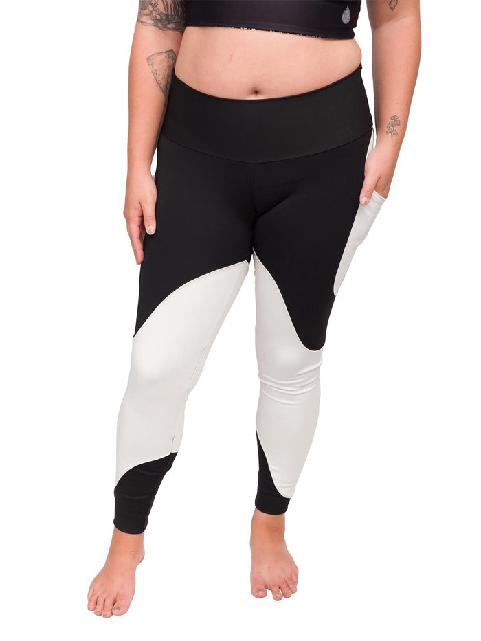 Model: Camilla is the Operations Manager here at Waterlust. She loves using her camera to communicate marine conservation issues. She is 5'8", 180lbs, and is wearing a L legging and L spotted eagle ray top (reverse side).