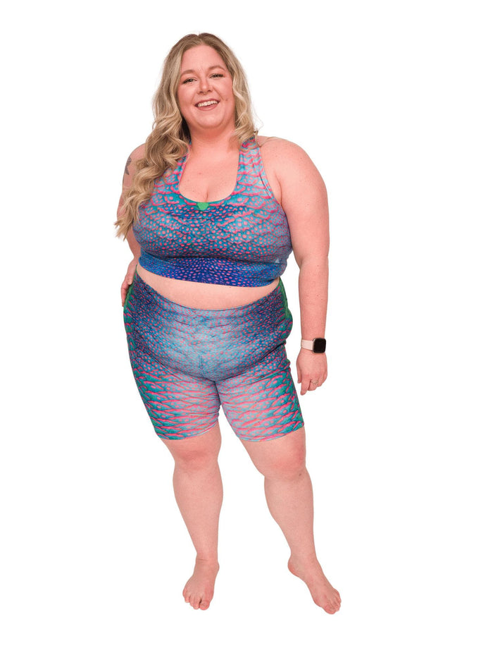 Model: Chelsea is a marine conservationist who believes that science is for everybody… and every BODY! She is 5'2", 230 lbs, 40DD and is wearing 3XL shorts and a 3XL reversible top.