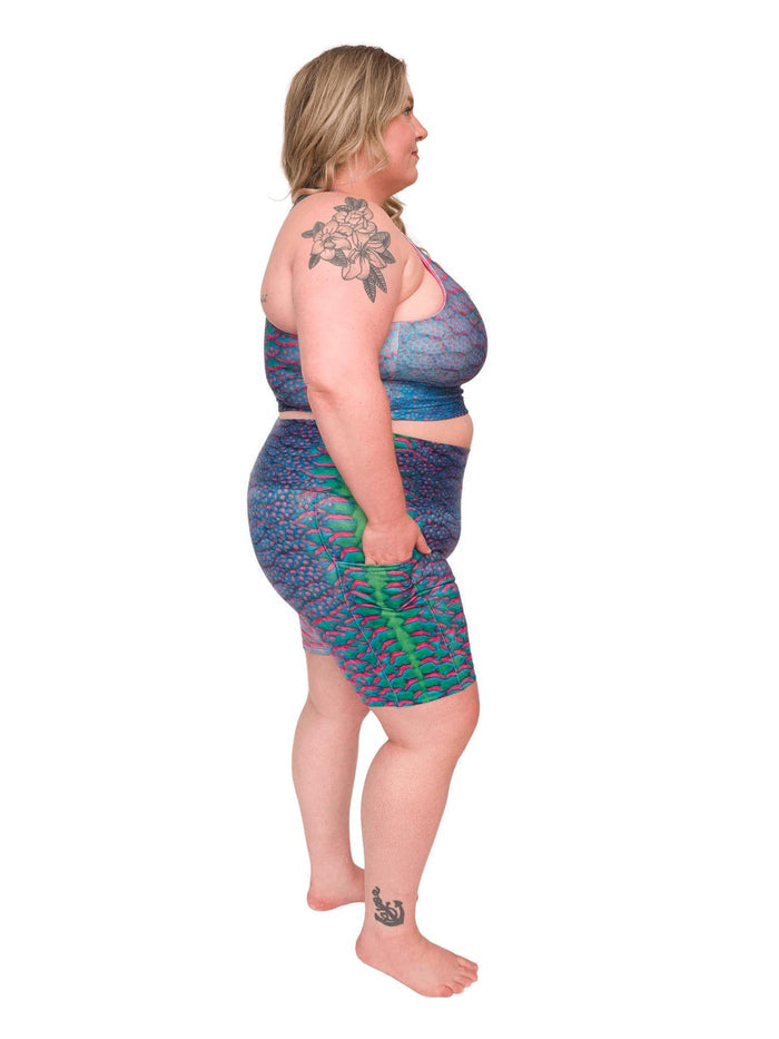 Model: Chelsea is a marine conservationist who believes that science is for everybody… and every BODY! She is 5'2", 230 lbs, 40DD and is wearing 3XL shorts and a 3XL reversible top.