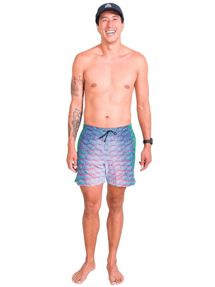Model: Kevin is a marine and molecular biologist researching the impacts of ocean warming on corals. He is 6'1", 175 lbs, and is wearing a size S short.