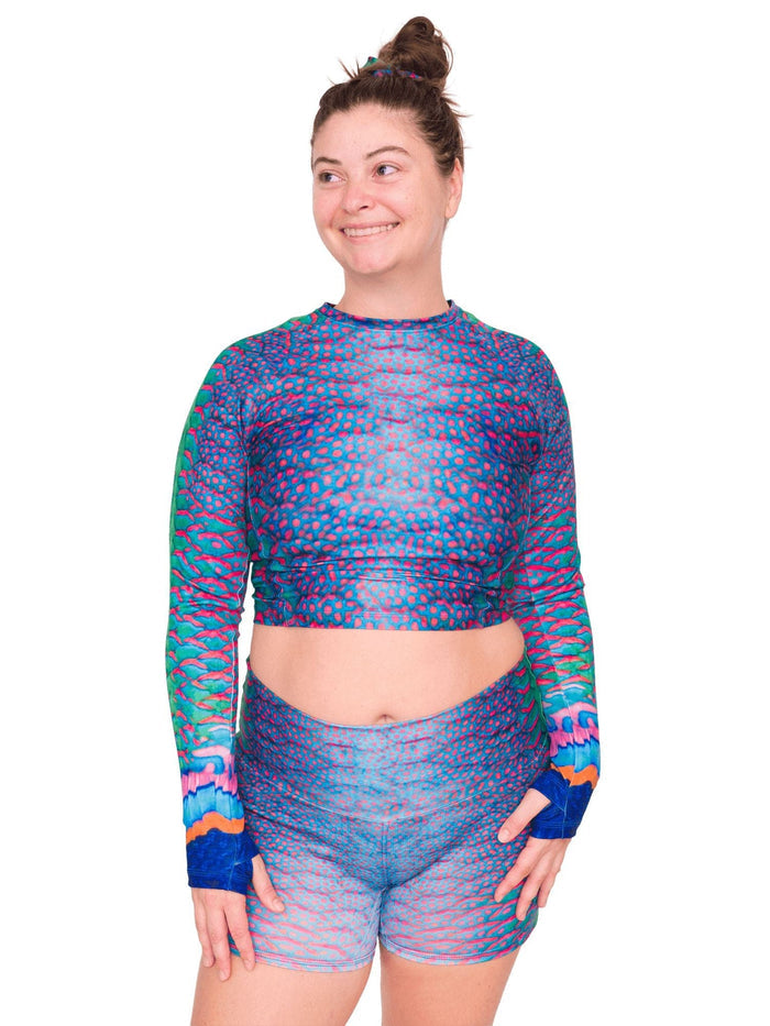 Model: Camilla is the operations manager here at Waterlust. She loves using her camera to communicate marine conservation issues. She is 5’8”, 180 lbs, 36B and is wearing a size L top and XL short.