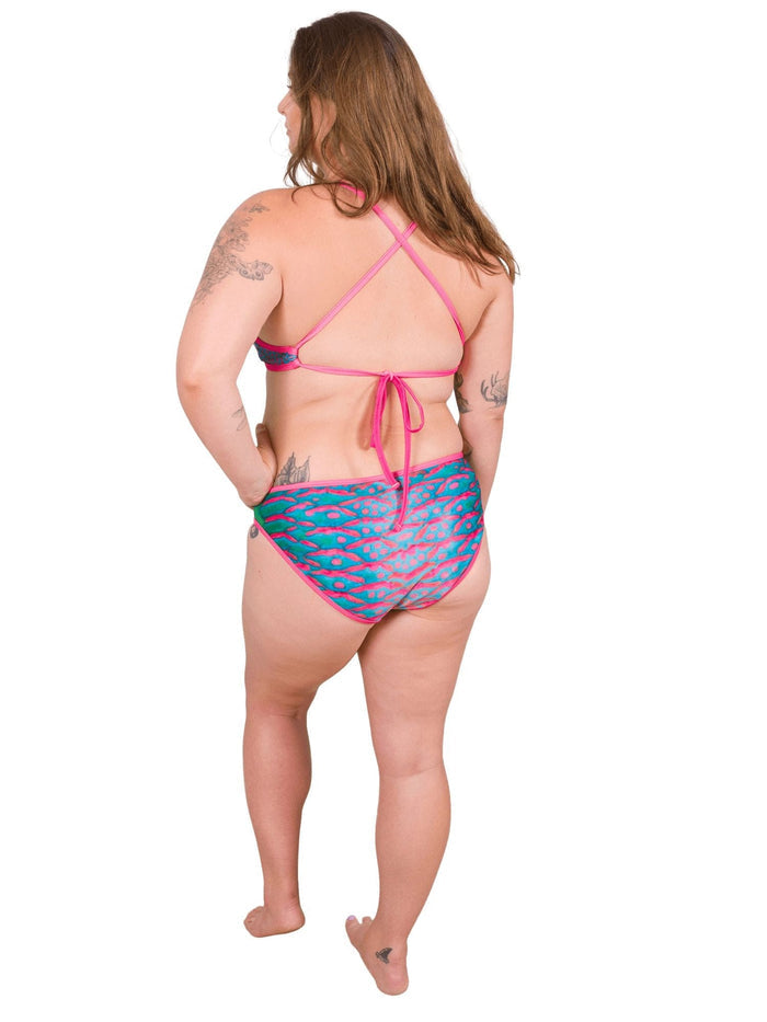 Model: Camilla is the Operations Manager here at Waterlust. She loves using her camera to communicate marine conservation issues. She is 5'8", 195 lbs, and is wearing an XL String Bikini Top and XL Classic Bikini Bottom.