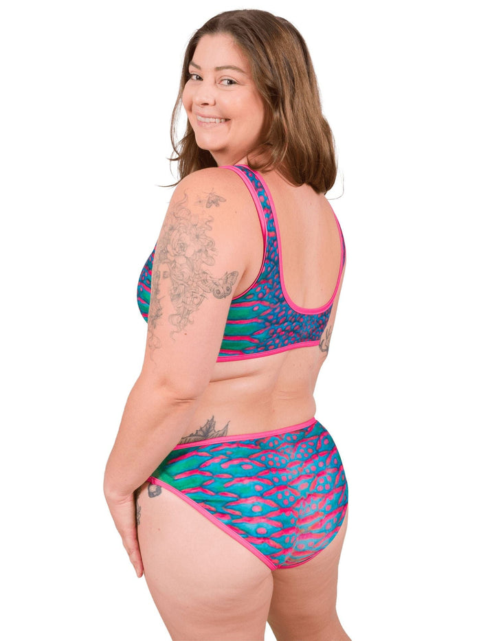Model: Camilla is the Operations Manager here at Waterlust. She loves using her camera to communicate marine conservation issues. She is 5'8", 195 lbs, 36D and is wearing an XL Scoop Bikini Top and XL Classic Bikini Bottom.