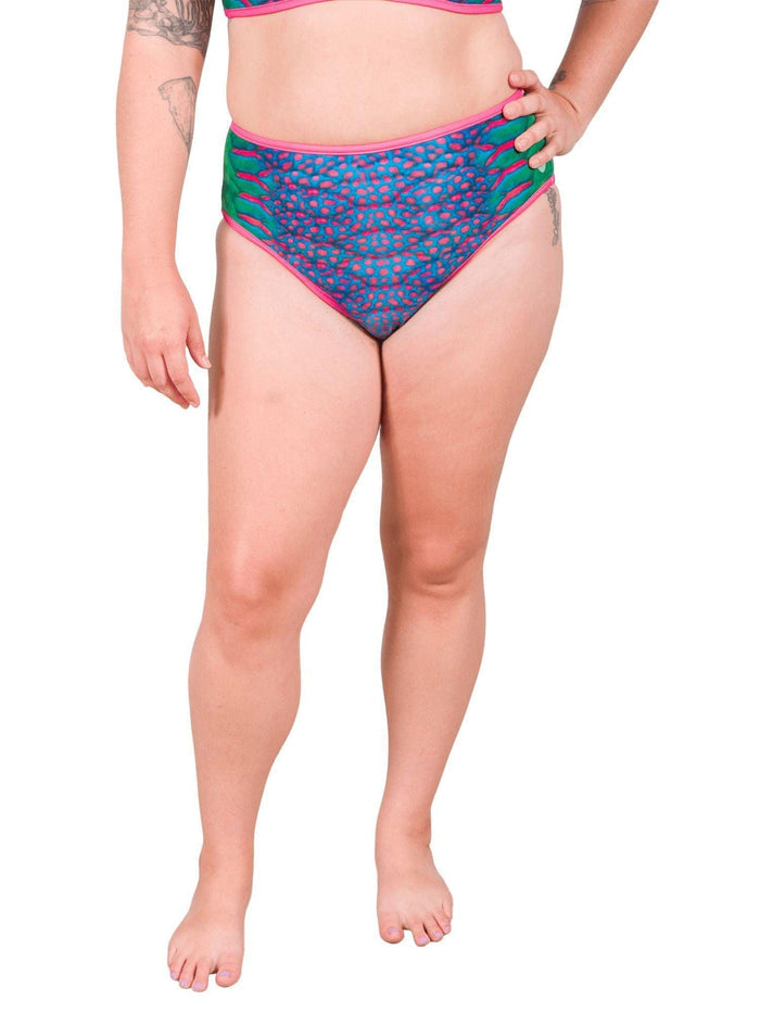 Model: Camilla is the Operations Manager here at Waterlust. She loves using her camera to communicate marine conservation issues. She is 5'8", 195 lbs and wearing a size XL High-Waisted Bikini Bottom.