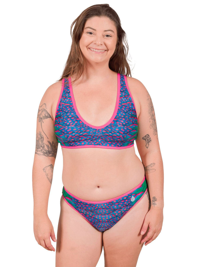 Model: Camilla is the Operations Manager here at Waterlust. She loves using her camera to communicate marine conservation issues. She is 5'8", 195 lbs, 36D and is wearing an XL Scoop Bikini Top and XL Classic Bikini Bottom.