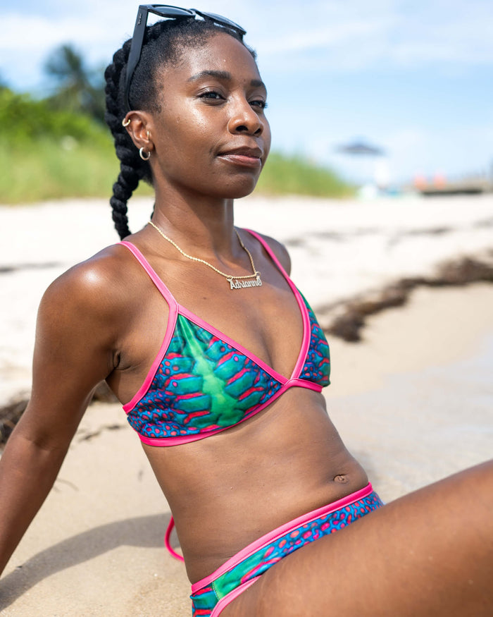 Model: Dr. Adrianne Wilson is a marine biologist specializing in age and growth, population genetics, and utilizing environmental DNA to advance marine conservation and fisheries research. She is 5'2", 124 lbs, 34A and is wearing a size S String Bikini Top and S Classic Bikini Bottom.